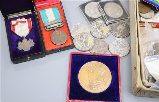 Assorted 18th to 20th century world coinage + medals to include a Macclesfield Half Penny, a Japanese order of the rising sun, 8th clas